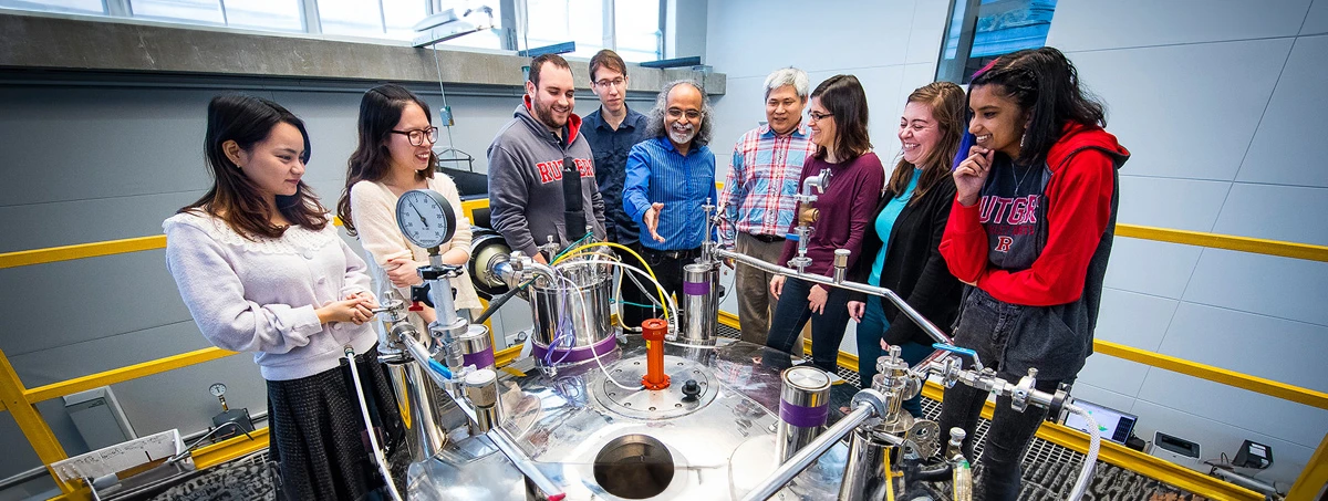 Students watching chemistry experiment