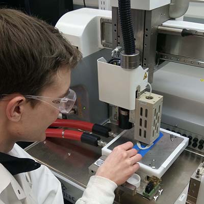 Student with 3D Printing Machine